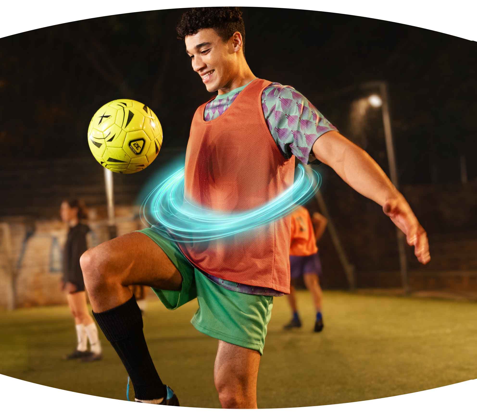 Image of a male ulcerative colitis (UC) TREMFYA® patient playing soccer with passion