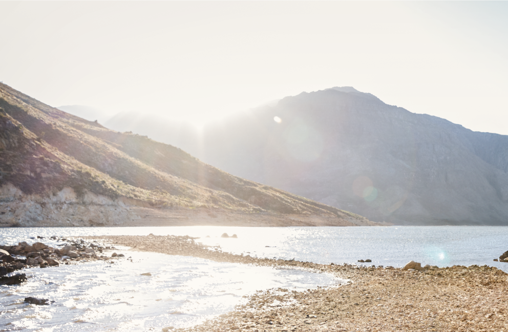 Background image of mountains and a river