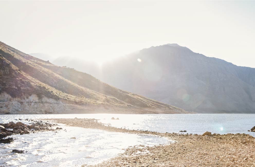 Background image of mountains and a river